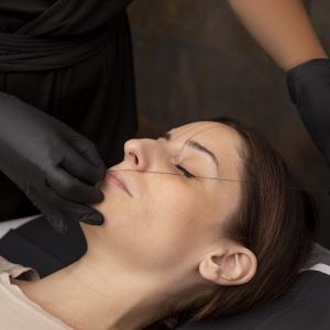 woman-going-through-microblading-procedure